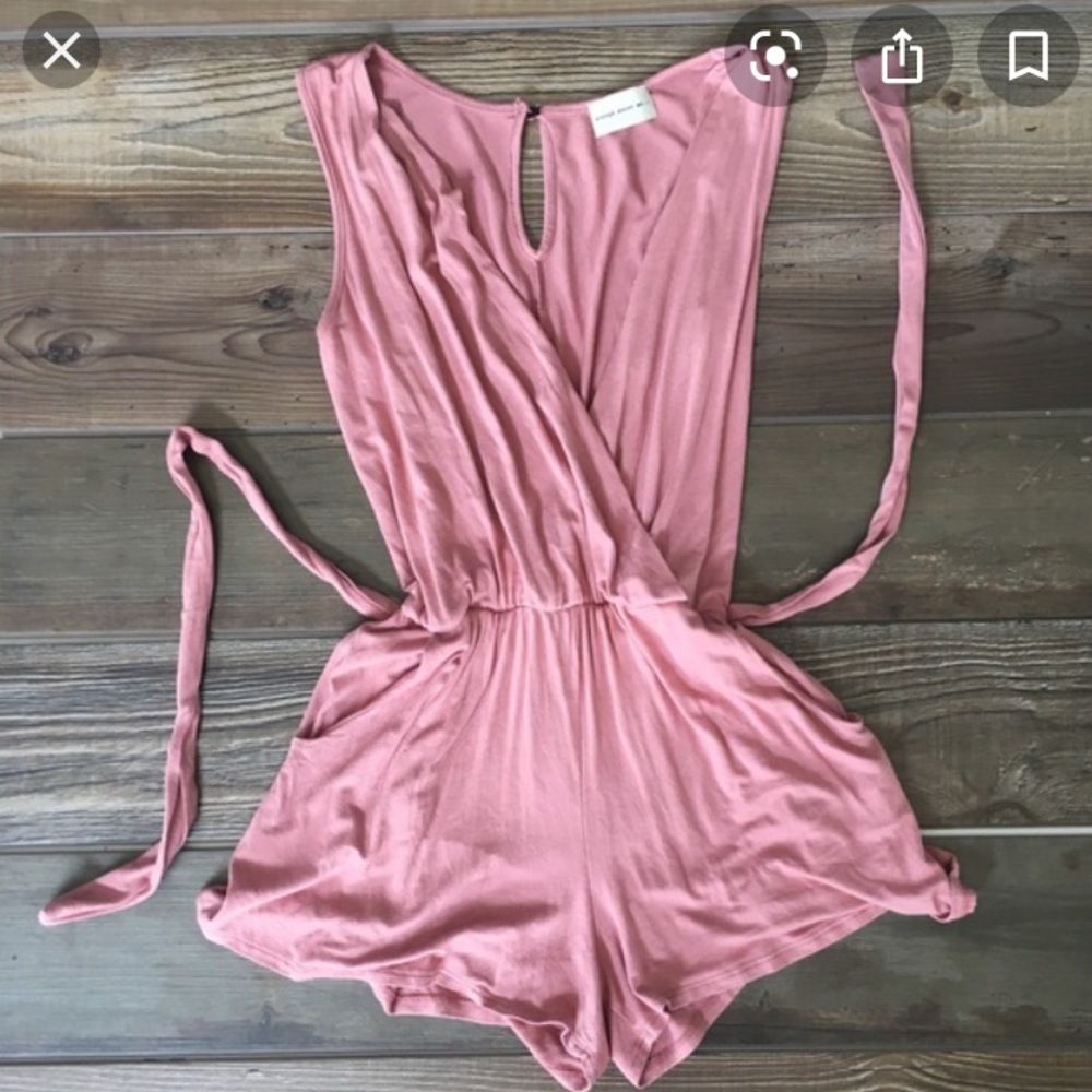 Rose colored romper with pockets